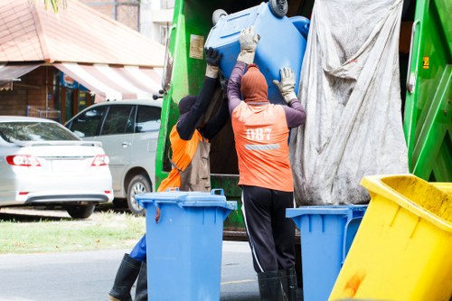 Crew loading items during a flat clearance